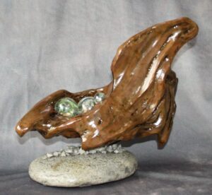 Driftwood, stone and glass