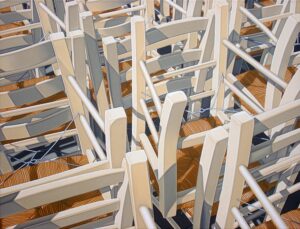 A painting of a group of stacked wooden cafe chairs, by Nick Hais